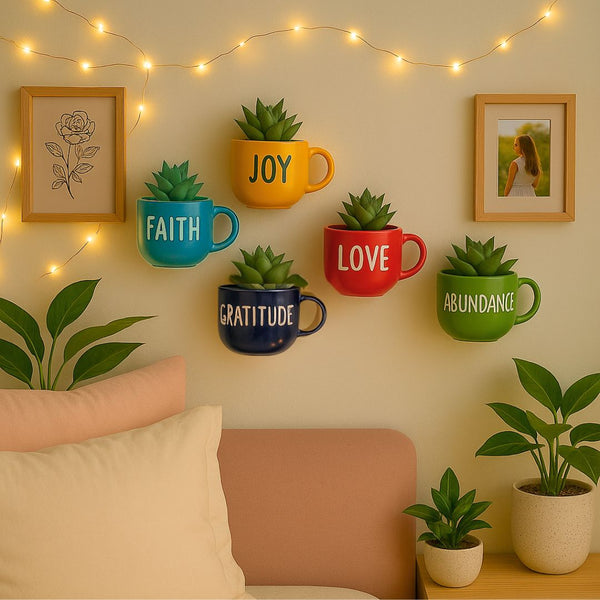 Colorful mugs with text and plants on a wall with string lights